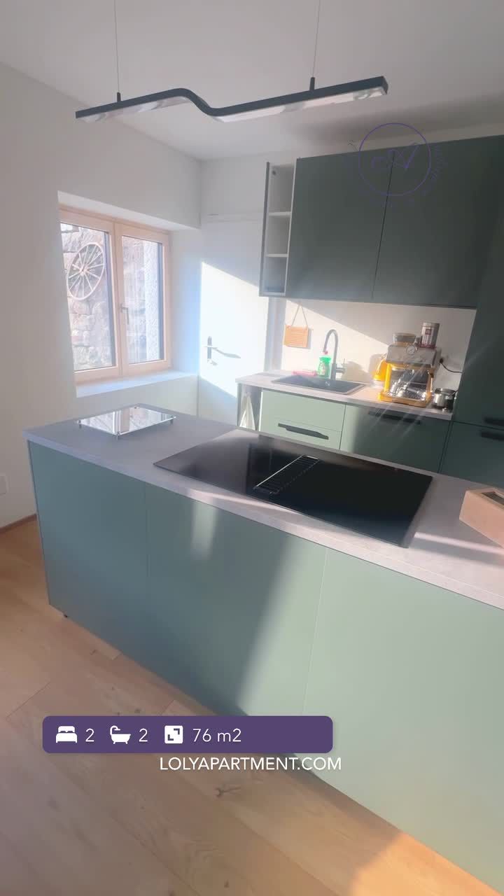 Cucina e zona pranzo dell'appartamento Deluxe